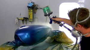 sparying a motorbike